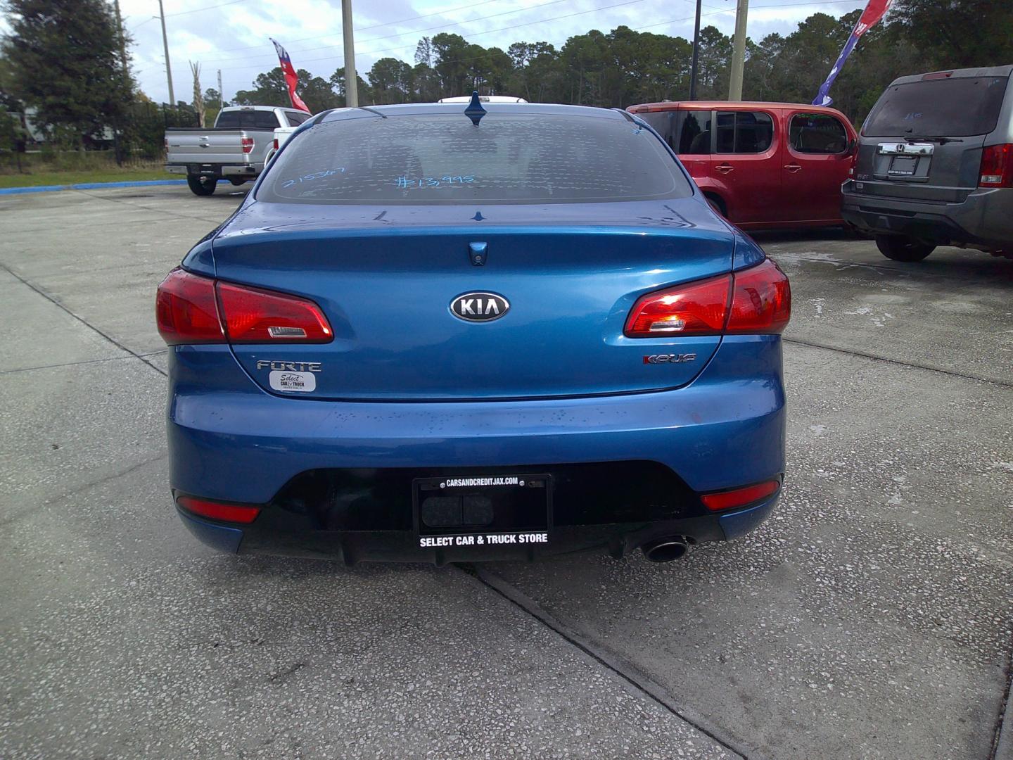 2014 BLUE KIA FORTE KOUP EX (KNAFX6A84E5) , located at 390 Hansen Avenue, Orange Park, FL, 32065, (904) 276-7933, 30.130497, -81.787529 - Photo#3